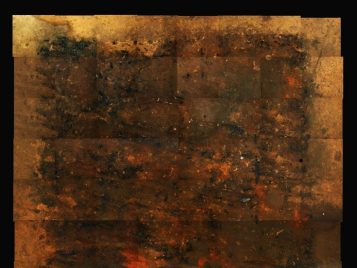 Mosaic top in gold, brown and orange.